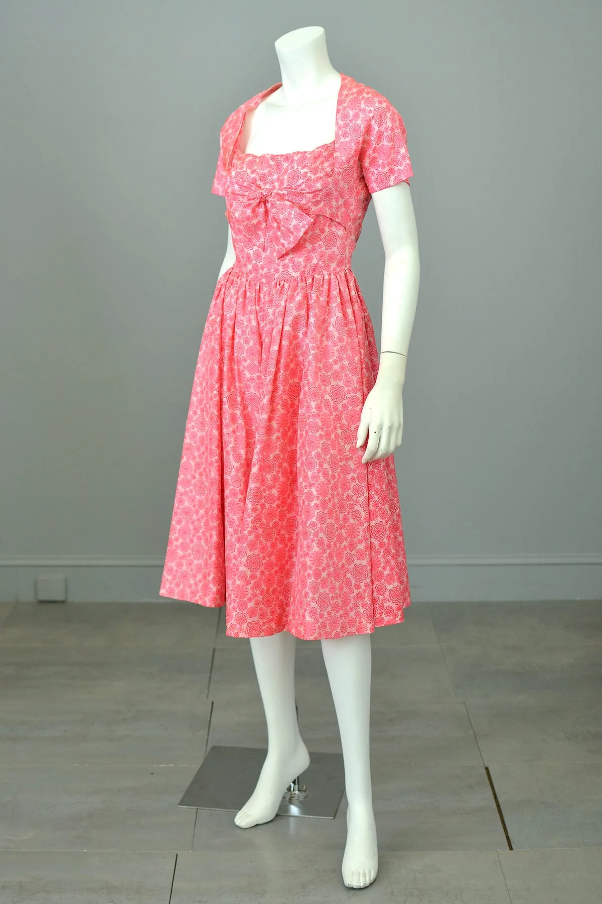 1950s Barbie Hot Pink Pinwheels Print Fit and Flare Party Dress with Attached Tie Front Shrug