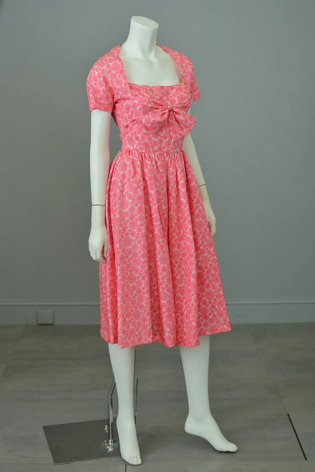 1950s Barbie Hot Pink Pinwheels Print Fit and Flare Party Dress with Attached Tie Front Shrug