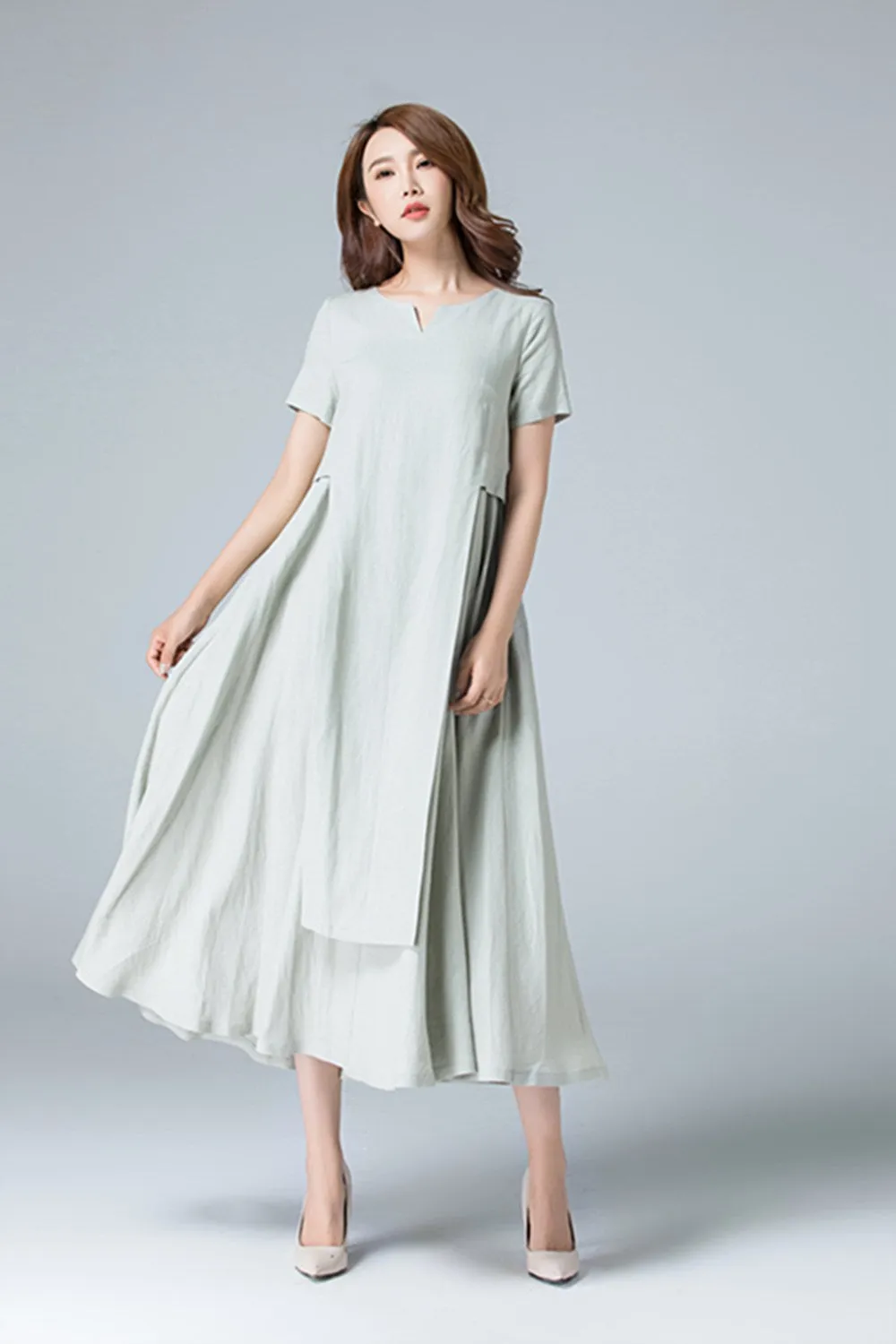 Plain linen dress with irregular folds 1787