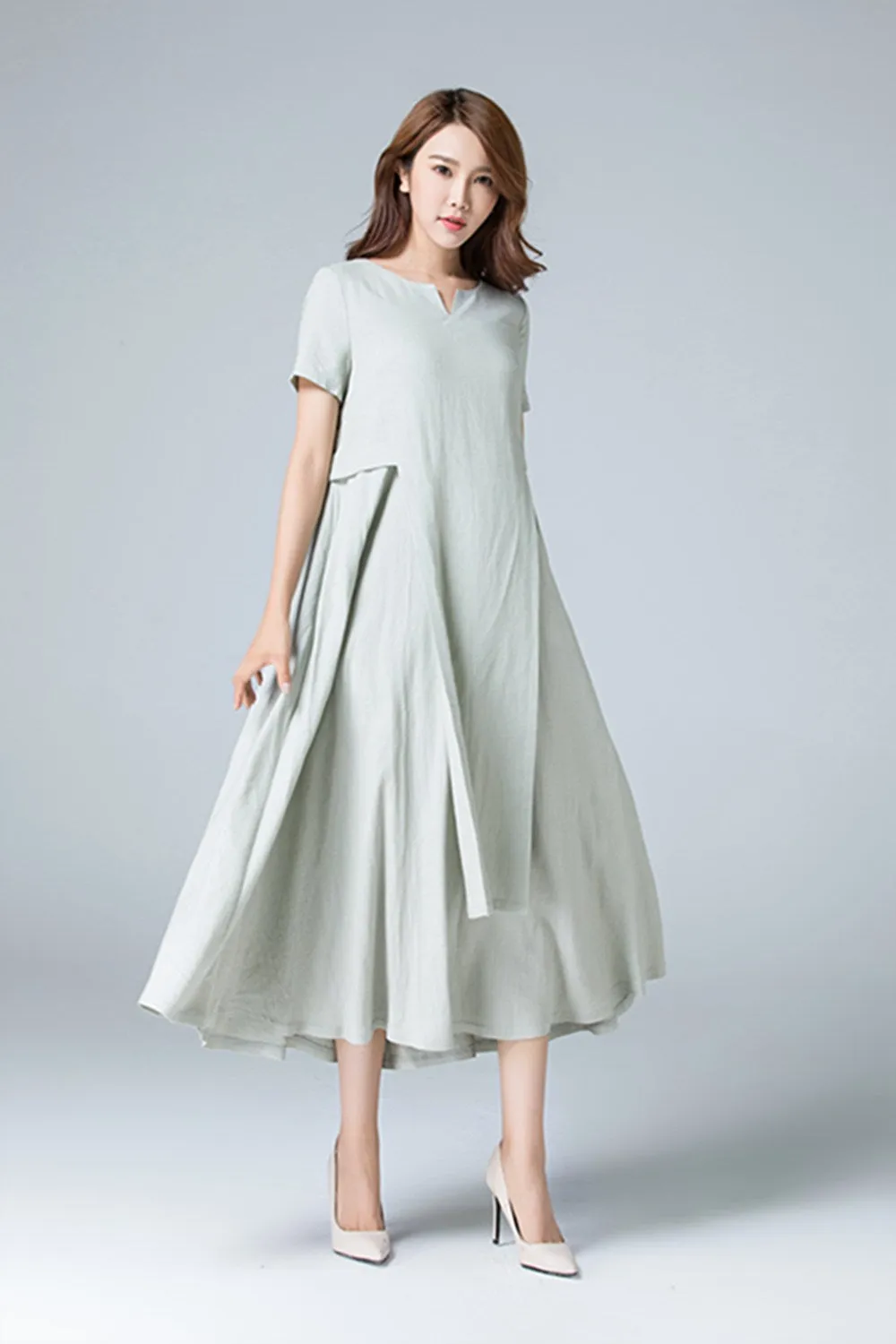 Plain linen dress with irregular folds 1787